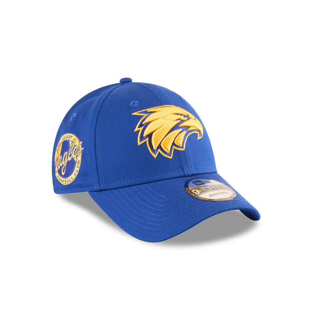 West Coast Eagles Youth Hat - AFL 2025 Badged Blue OTC 9Forty Kids Strapback Cap - New Era
